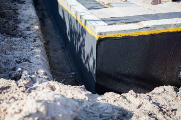 Professional Foundation Crack Repair technician working in Six Lakes, MI